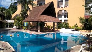 Bazén v ubytování Hotel Plaza Caribe nebo v jeho okolí