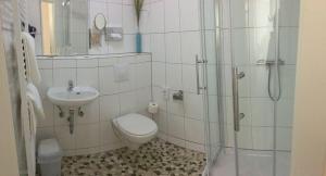 Koupelna v ubytování Hotel Goldener Anker