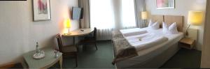 Postel nebo postele na pokoji v ubytování Hotel Goldener Anker
