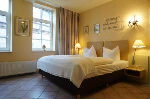 Postel nebo postele na pokoji v ubytování Hotel Goldener Anker