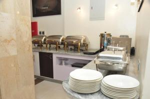A cozinha ou kitchenette de Citiheight Hotel
