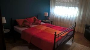 Posteľ alebo postele v izbe v ubytovaní Apartment J&M