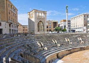 a large amphitheater in a city with buildings at L'ANGOLO DI OLI' in Lecce