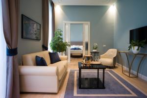 TV a/nebo společenská místnost v ubytování Turin Palace Hotel