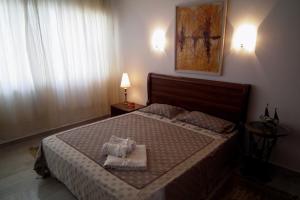 Cama o camas de una habitación en Sandy Beach Apartment 13
