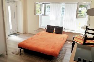 Una cama o camas en una habitación de Bungalow am Stadtrand