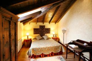 Ένα ή περισσότερα κρεβάτια σε δωμάτιο στο Hotel Boutique Real Casona De Las Amas
