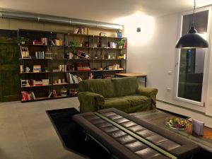 Posezení v ubytování Pove 2.4 Hotel