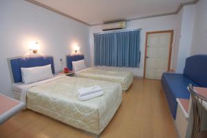 Voodi või voodid majutusasutuse P.A. Place Hotel toas