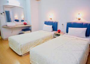Voodi või voodid majutusasutuse P.A. Place Hotel toas
