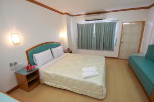 Voodi või voodid majutusasutuse P.A. Place Hotel toas