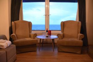 Istumisnurk majutusasutuses Scorpios Sea Side Hotel