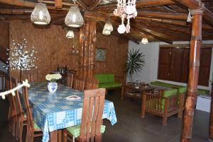 a dining room with a table and chairs at La Casa Maruja in Lima