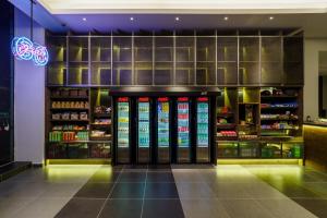 a store with a store front with a lot of products at Tune Hotel KLIA-KLIA2, Airport Transit Hotel in Sepang