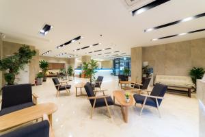 Posezení v ubytování Reborn Suwon Silkroad Hotel
