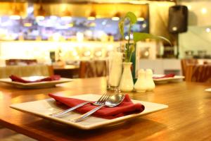 A restaurant or other place to eat at Omni Tower Sukhumvit Nana by Compass Hospitality
