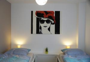 Ένα ή περισσότερα κρεβάτια σε δωμάτιο στο Apartment Seven