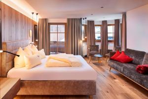 Rúm í herbergi á Bauernhof Hotel Oberschwarzach