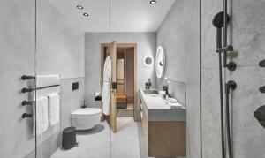 Baðherbergi á Hotel Weisses Roessl