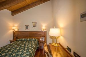Posteľ alebo postele v izbe v ubytovaní Hotel Conteverde + 37 fotografií