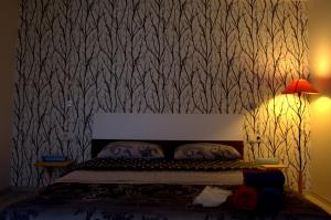 Una cama o camas en una habitación de Konukevim Apartments