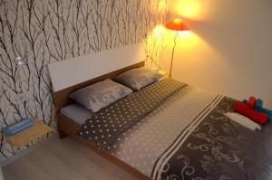 Postel nebo postele na pokoji v ubytování Konukevim Apartments