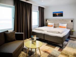Postel nebo postele na pokoji v ubytování ArenaHotellet i Uppsala + 37 fotografií