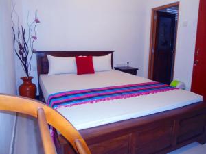 Cama o camas de una habitación en Palmary Beach Villa