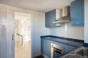 Kuchyňa alebo kuchynka v ubytovaní Apartamentos Marta PLAYA
