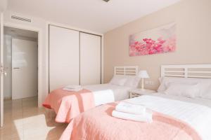 Posteľ alebo postele v izbe v ubytovaní Apartamentos Marta PLAYA