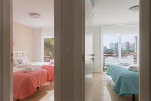 Posteľ alebo postele v izbe v ubytovaní Apartamentos Marta PLAYA