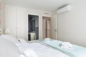 Posteľ alebo postele v izbe v ubytovaní Apartamentos Marta PLAYA