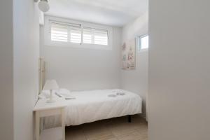 Posteľ alebo postele v izbe v ubytovaní Apartamentos Marta PLAYA