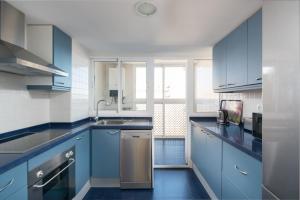 Kuchyňa alebo kuchynka v ubytovaní Apartamentos Marta PLAYA