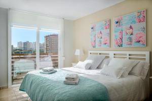 Posteľ alebo postele v izbe v ubytovaní Apartamentos Marta PLAYA
