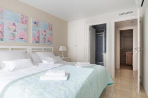 Posteľ alebo postele v izbe v ubytovaní Apartamentos Marta PLAYA