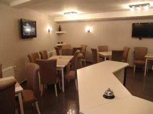 TV a/nebo společenská místnost v ubytování Hotel Prima