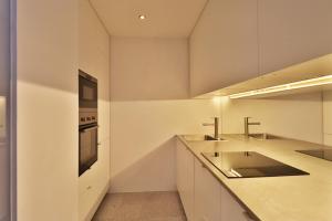 A kitchen or kitchenette at Appartements Christophorus Még 37 kép