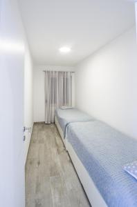 Ένα ή περισσότερα κρεβάτια σε δωμάτιο στο Mare