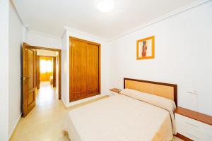 A bed or beds in a room at ALEGRIA ID51