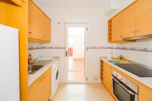 A kitchen or kitchenette at ALEGRIA ID51
