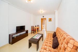 A television and/or entertainment centre at ALEGRIA ID51