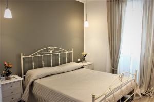 Postel nebo postele na pokoji v ubytování Don Peppe B&B