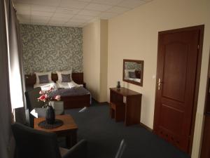 Posteľ alebo postele v izbe v ubytovaní SanatoriumnadKryniczanką