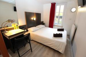 Letto o letti in una camera di Hôtel La Chartreuse
