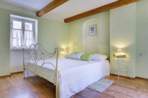 Posteľ alebo postele v izbe v ubytovaní Holiday Home Ruža
