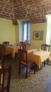 Restoranas ar kita vieta pavalgyti apgyvendinimo įstaigoje Affitta Camere Il Commercio