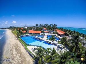 an aerial view of a resort on the beach at Serrambi Resort in Porto De Galinhas