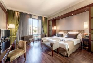 Posteľ alebo postele v izbe v ubytovaní Hotel Barcelona Center + 34 fotografií