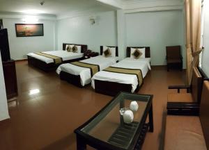 Кровать или кровати в номере Tran Ly Hotel